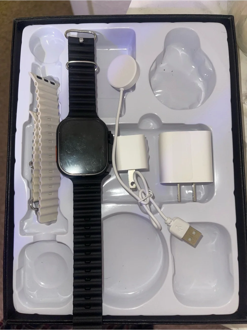 Unbranded Black Smartwatch with Extra Beige Strap and Charger